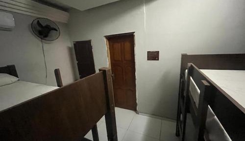 Single Bed in Dormitory Room