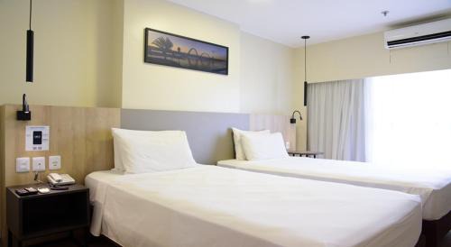 Quarto Deluxe com duas camas de solteiro”