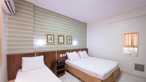 Triple Room (1 double bed and 1 single bed)