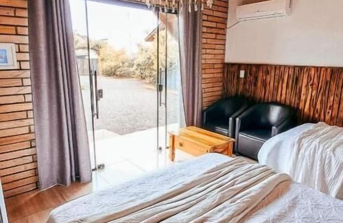 Praia Grande Hotel | Chalés Manacá dos Canyons