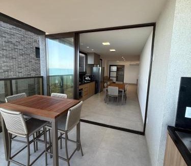 Anchieta Apartment | Luxo à Beira Mar com 3 suites e varanda Goumert com churrasqueira vista para o mar