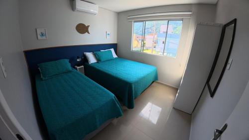 Pantano do Sul Apartment | Residencial Mariano 6 - Vista para praia e Mar