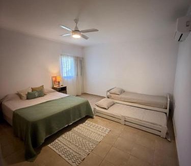 Arroyo Leyes House | Entreverdes, Casas de alquiler - Casa Jacarandá