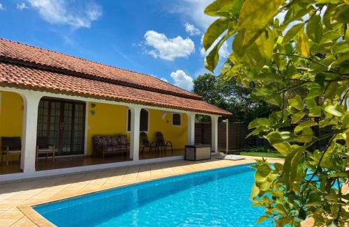 Analandia Hotel | Pousada casa amarela Analândia SP