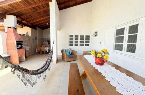 Indaia House | CASA ACONCHEGANTE e PERTINHO DA PRAIA