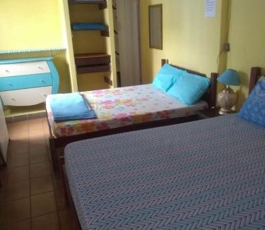 Centro House | Suíte Aconchegante